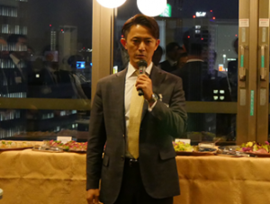 懇親会にて主催者代表挨拶（田中副会長）